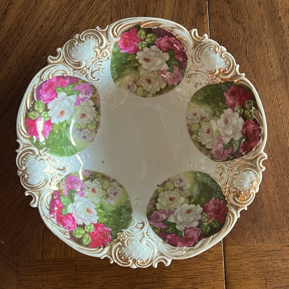 Porcelain bowl with rose appliqués hand made with gold detail